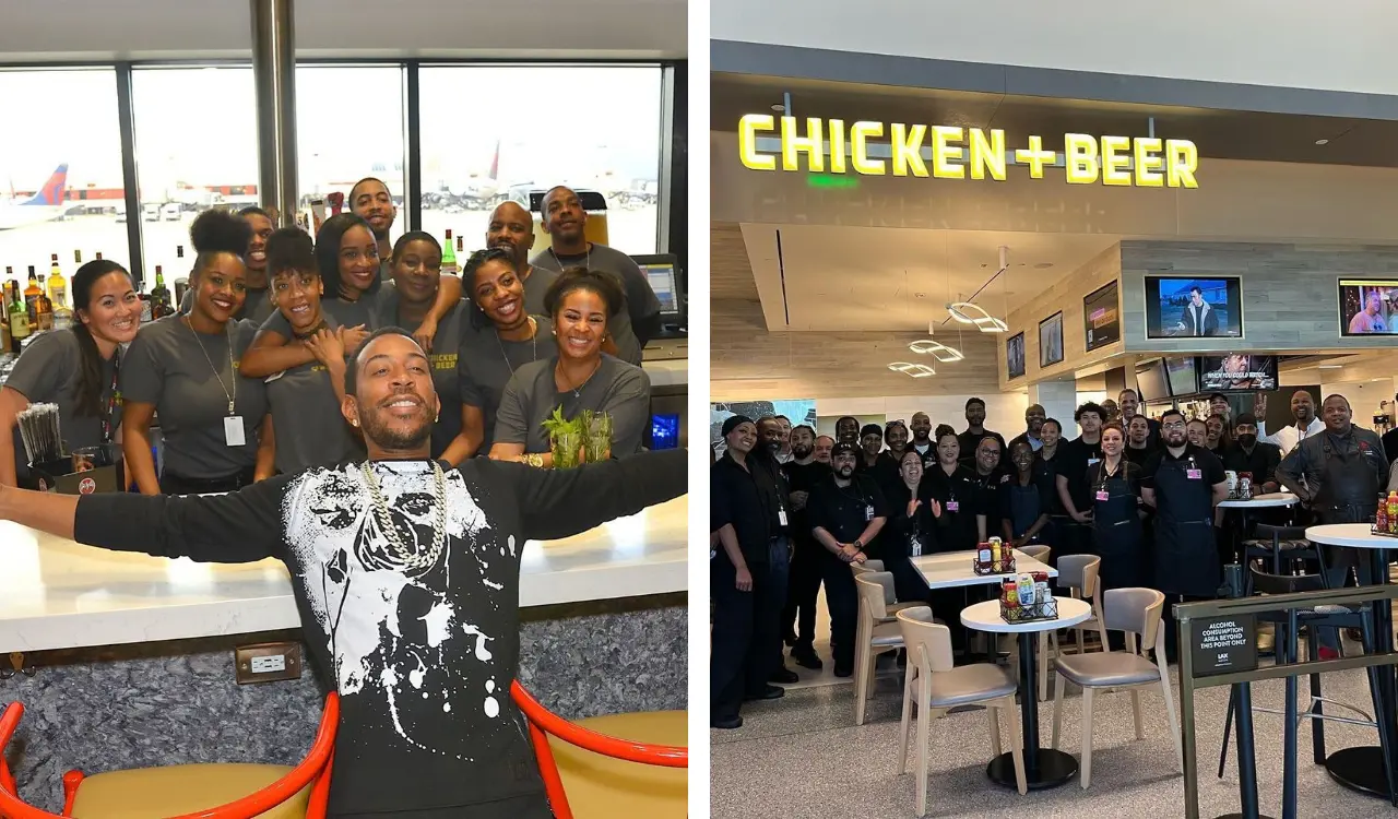 Ludacris poses with the staff of his restaurant Chicken-n-Beer.